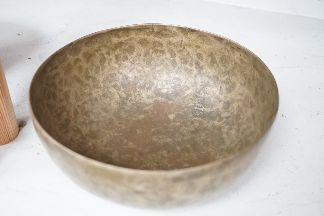 A group of Himalayan brass or metalware bowls and a 'singing' bowl. Condition - fair to good